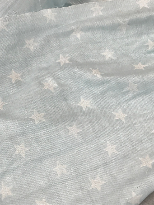 ジャガード織トリプルガーゼ綿100%生地お星様柄薄い水色 1枚目の画像