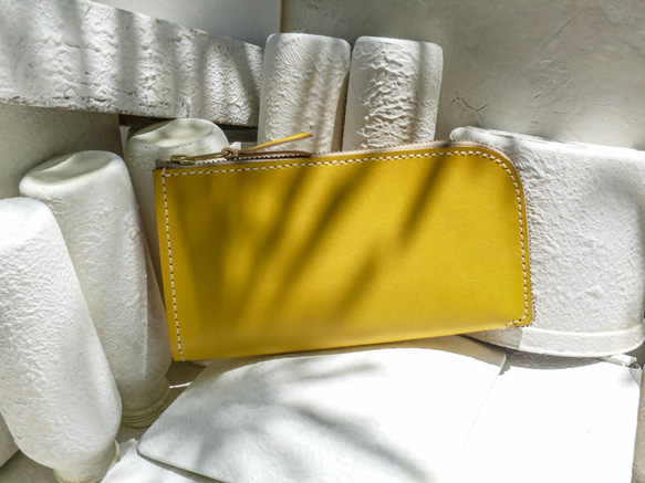 「不撞包」檸檬黃植鞣革真皮萬用皮夾 第1張的照片