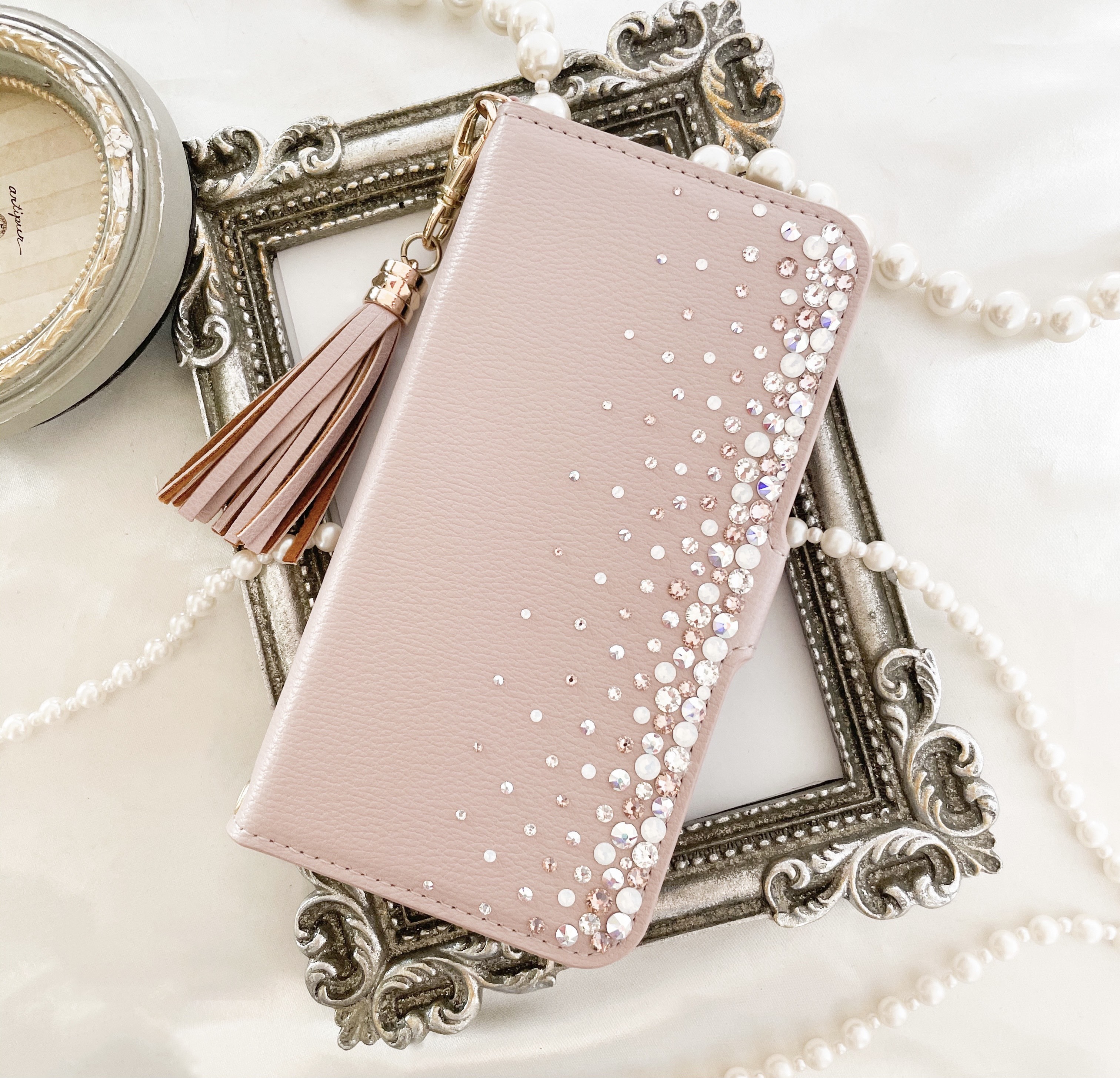 手帳型Phone17pro他 スモーキーピンクベージュヴィンテージオーロラmixスワロフスキーデコケースくすみニュアンス