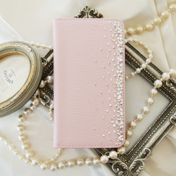 手帳型桜色ピンクiPhone全機種　スワロフスキー クリスタルオーロラ ポイントデコレーション スマホケース 2枚目の画像