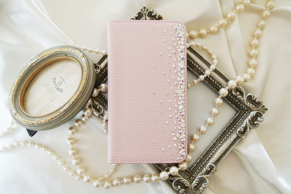 手帳型桜色ピンクiPhone全機種　スワロフスキー クリスタルオーロラ ポイントデコレーション スマホケース 2枚目の画像