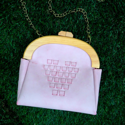 [今日]ピンクスウィートハートレザー編みサイドバックパックピンクスウィートハートレザーバッグ 1枚目の画像