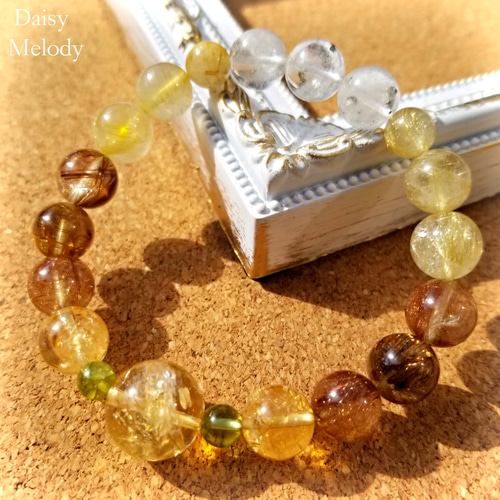 大粒ルチルクォーツとオニキスの天然石デザインブレスレット