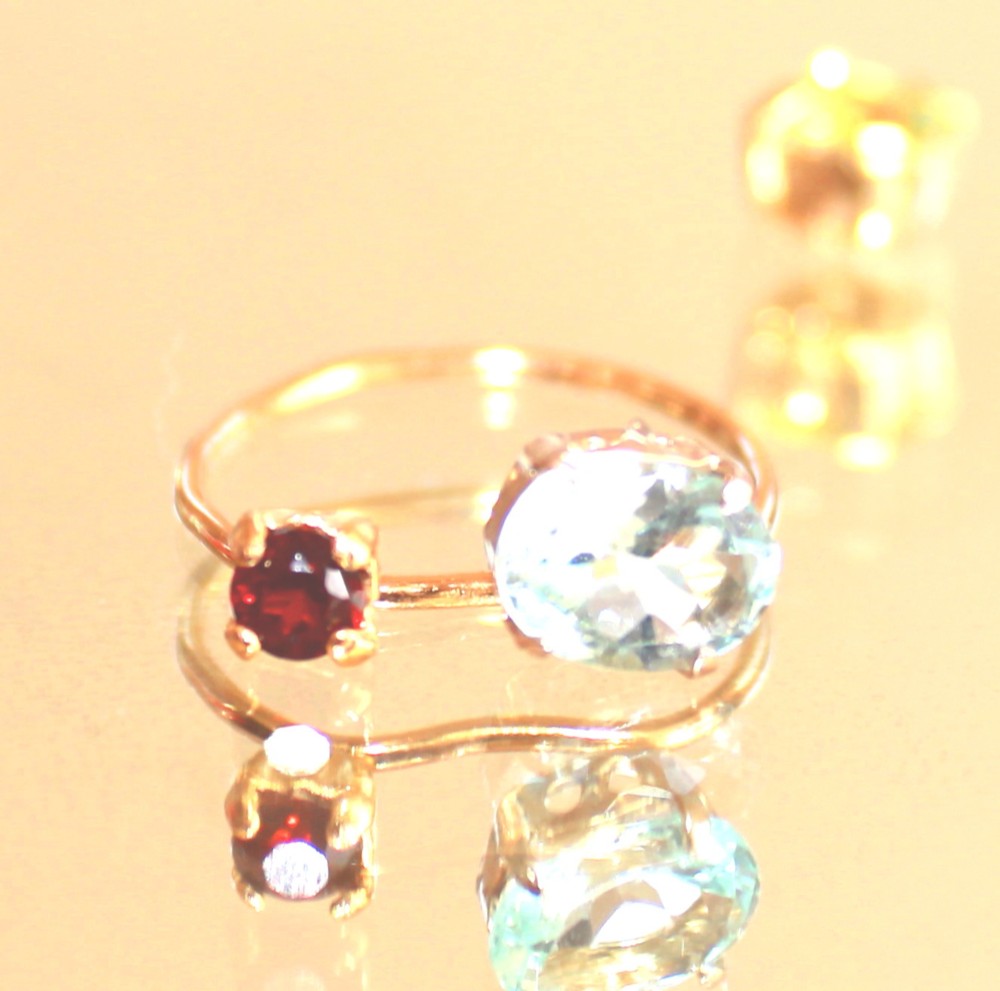 - golden autumn - Garnet & Blue Topaz Ring