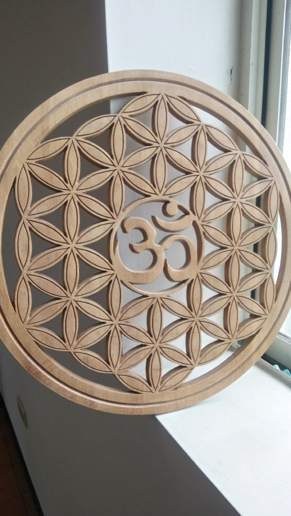 Flower of life wood carving 第4張的照片