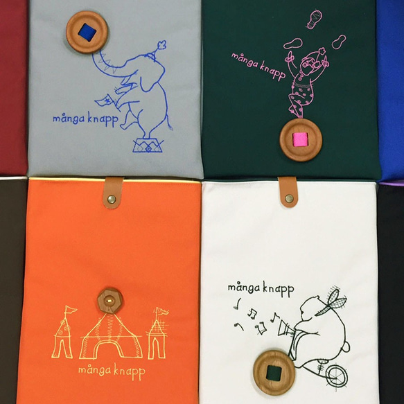 タブレットケース ポケット付き 収納 アニマル 動物 サーカス テント ピエロ ケース 刺繍 ボタン 4枚目の画像