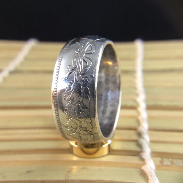 戒指由日本老银币制成(纯银80％)１７号尺寸 第2張的照片