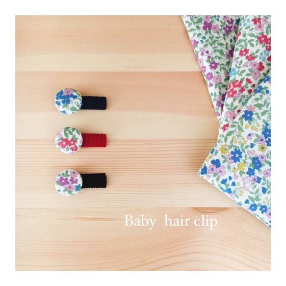 コロンと可愛いお花のベビーヘアクリップ 1枚目の画像