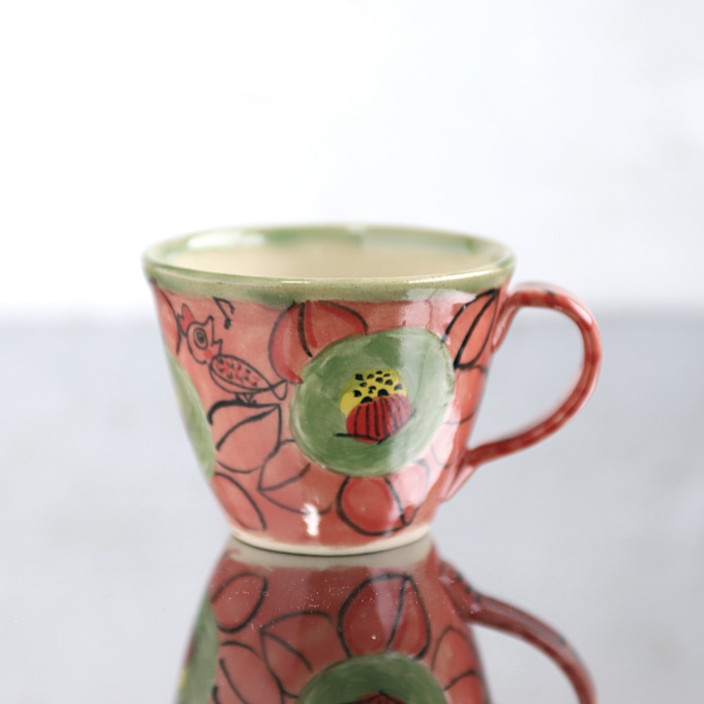 スマイルカメリアと鳥のマグカップ（オレンジ)