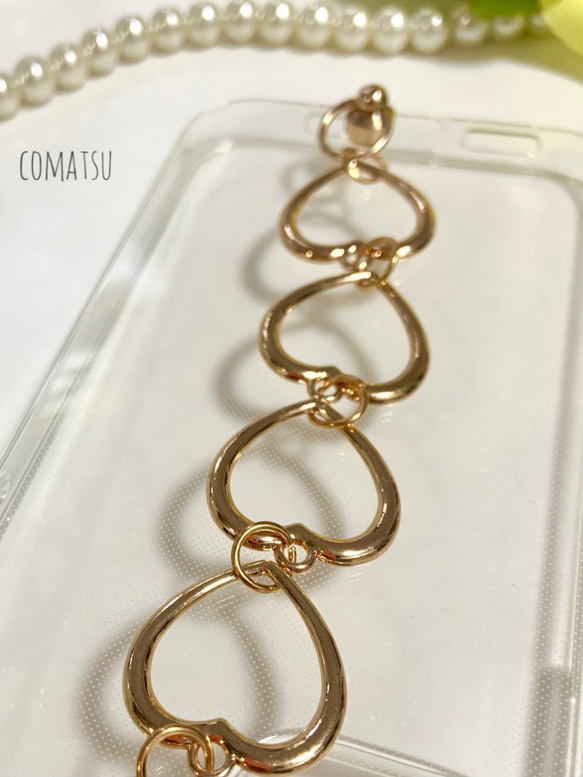 【全機種対応】シンプル ハート ハンドホルダー スマホケース ベルト ストラップ付きソフトカバー 落下防止にも◎ 2枚目の画像