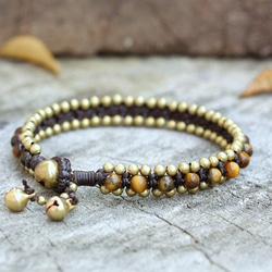 successful tiger's eye brass bell wax cord bracelet 第2張的照片