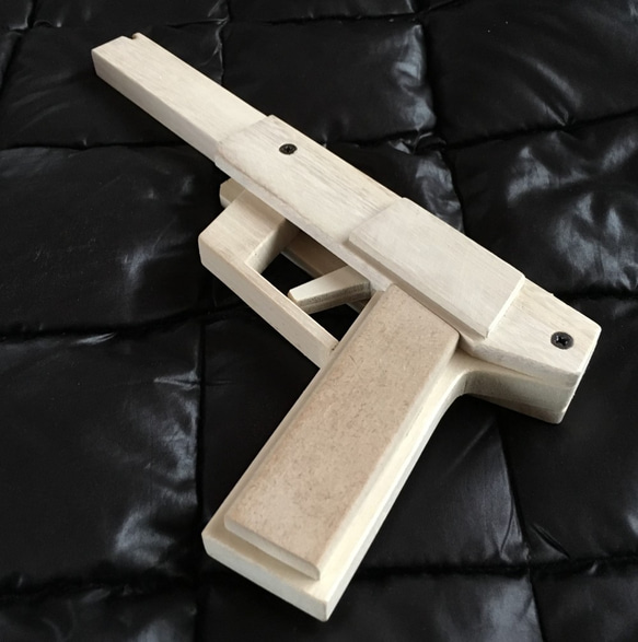 木製10連発輪ゴム銃＋パタッと倒れる単品的４個入りセット 4枚目の画像