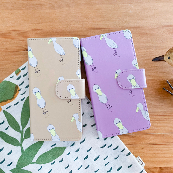 ハシビロコウカーニバル　手帳型スマホケース 紫　茶　【iPhone,Android】 1枚目の画像