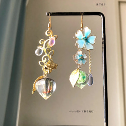 宝石魔法のガラスペンデュラムのピアス イヤリング 紅ひし形