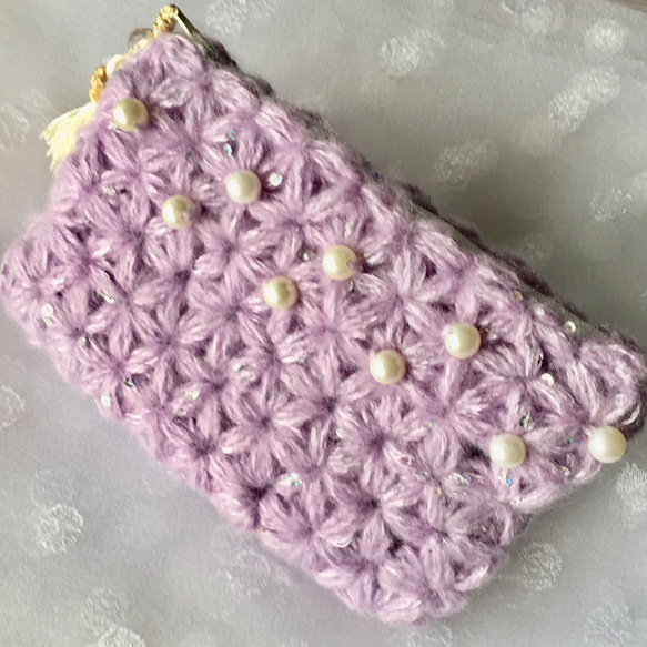 小花模様のリフ編みポーチ 1枚目の画像