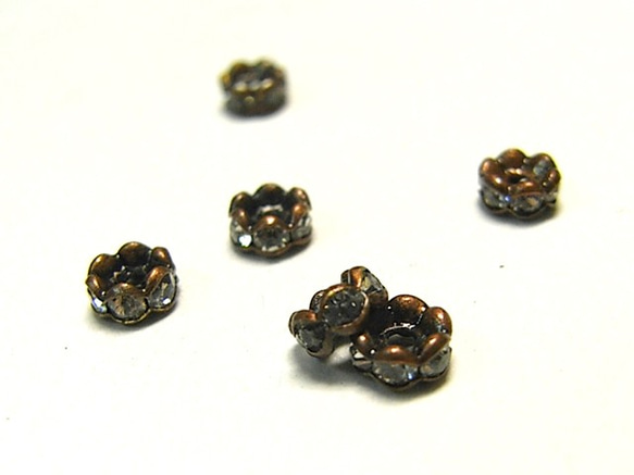 アクセサリーパーツ 波ロンデル 銅古美 約4mm 【約50個入り】6000229 1枚目の画像