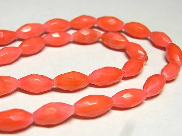珊瑚(染色) 連販売 ピンク オーバルカット 約9×5mm 3000687 1枚目の画像