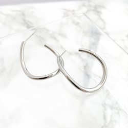 curve line hoop pierces 第1張的照片