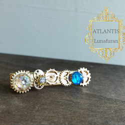 エメラルドグリーンの宝石風ヘアゴム / 青 / 半球 / レジン / 海