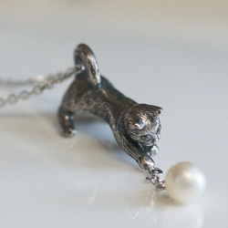 珍珠和貓項鍊 第2張的照片
