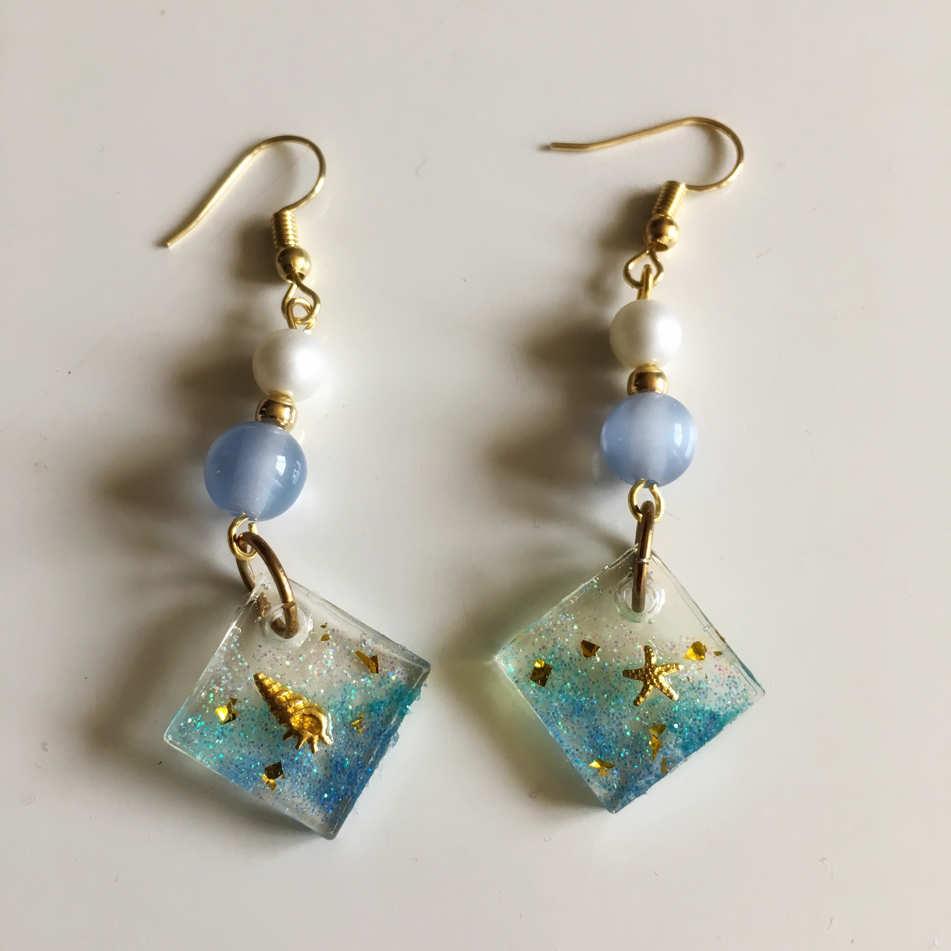 キラキラ　レジン　ピアス　イヤリング+100円　シェル ブルー　パープル 楽天市場】〈770円福袋チケット対象〉ピアス イヤリング
