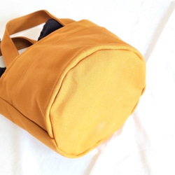 ジンジャーオレンジ帆布バケツ型トートバッグ・ポケット・巾着付き 3枚目の画像