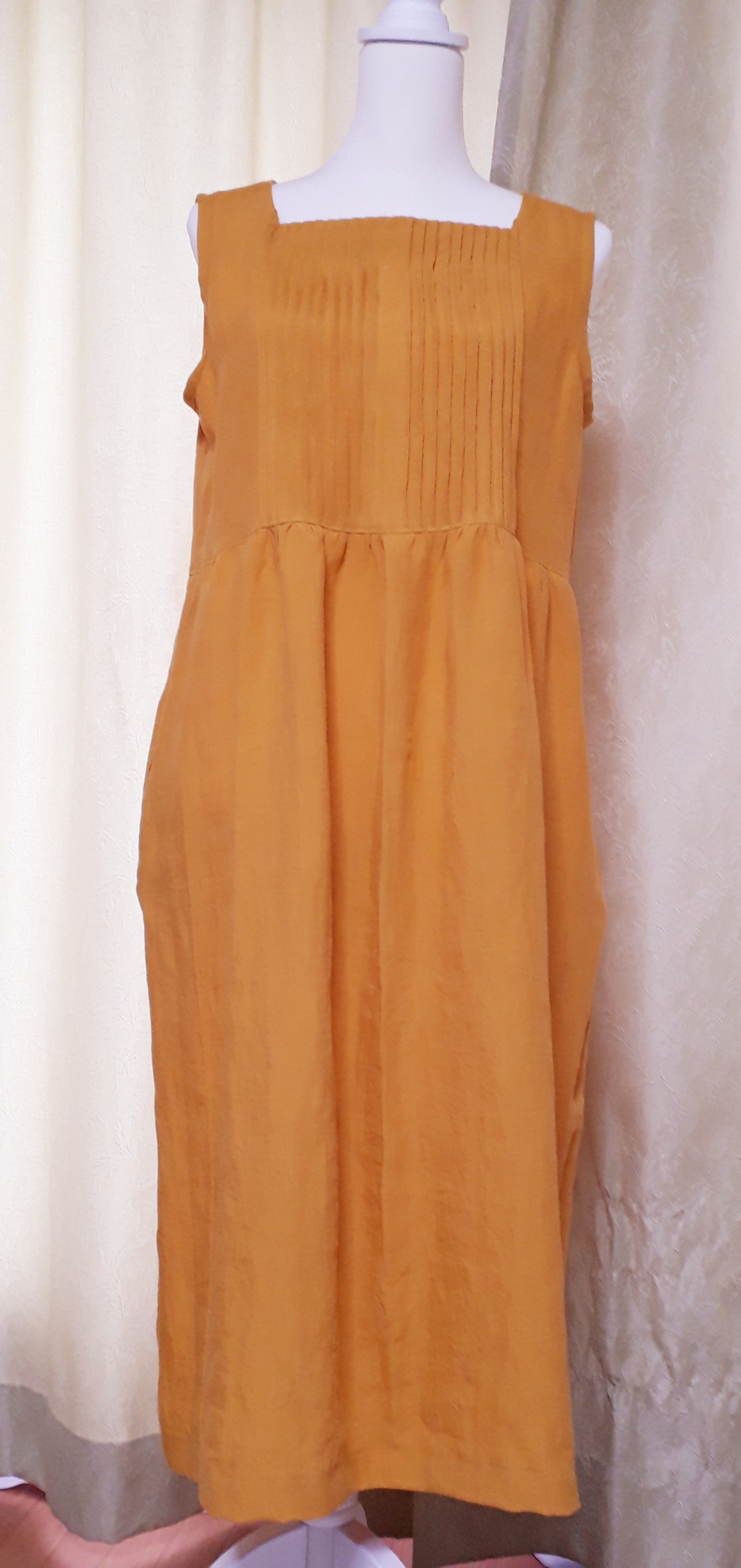 黄色のがまぐちとワンピースのセット