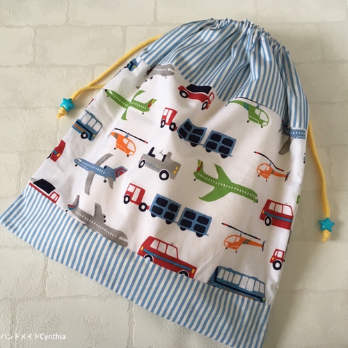 ハンドメイド☆ネイビー。アカ＆ホワイトくるまプリント片側紐出し巾着