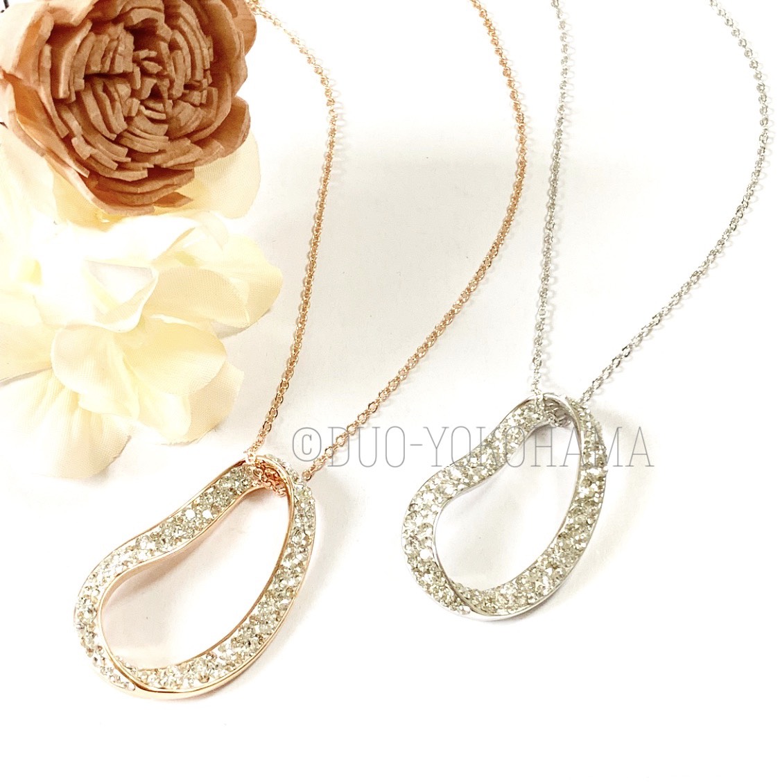 【送料無料】変形サークル ロングネックレス ピンクゴールド スワロフスキー
