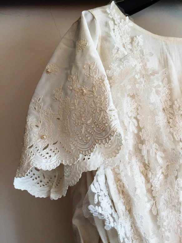 棉麻珍珠貝殼白色輕婚紗 第2張的照片