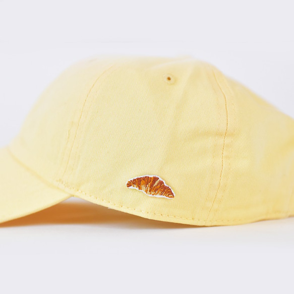 [黃色] 棉帽；帶羊角麵包刺繡 第2張的照片