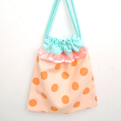 キャンディドットの巾着とランチョンマットセット(オレンジ) 通園通学 給食袋 コップ袋 3枚目の画像