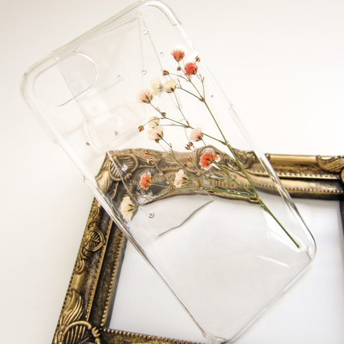 オレンジグラデーションのかすみ草 押し花iPhoneケース