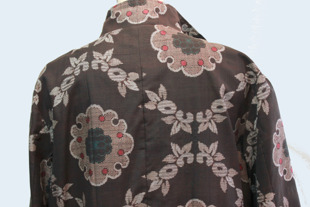 泥大島スタンド衿のコート