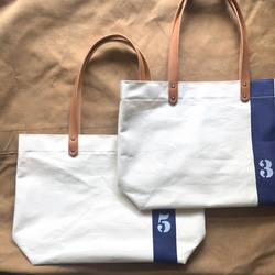 お好きな文字を鞄に。数字、アルファベットからどうぞ。岡山産生成り帆布バッグA4対応 1枚目の画像