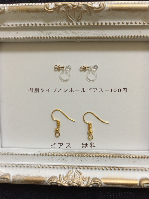 タータンチェック柄リボンとニコちゃんマークのイヤリング 2枚目の画像