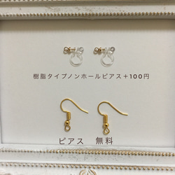 ミニニコちゃんマークとデニムリボンのイヤリング 2枚目の画像