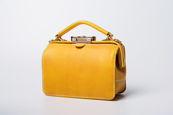 ダレスタイプ 小型 がま口バッグ 本革手作りのレザーショルダーバッグ 手染め / 総手縫い　手持ち 肩掛け 2WAY 鞄 1枚目の画像