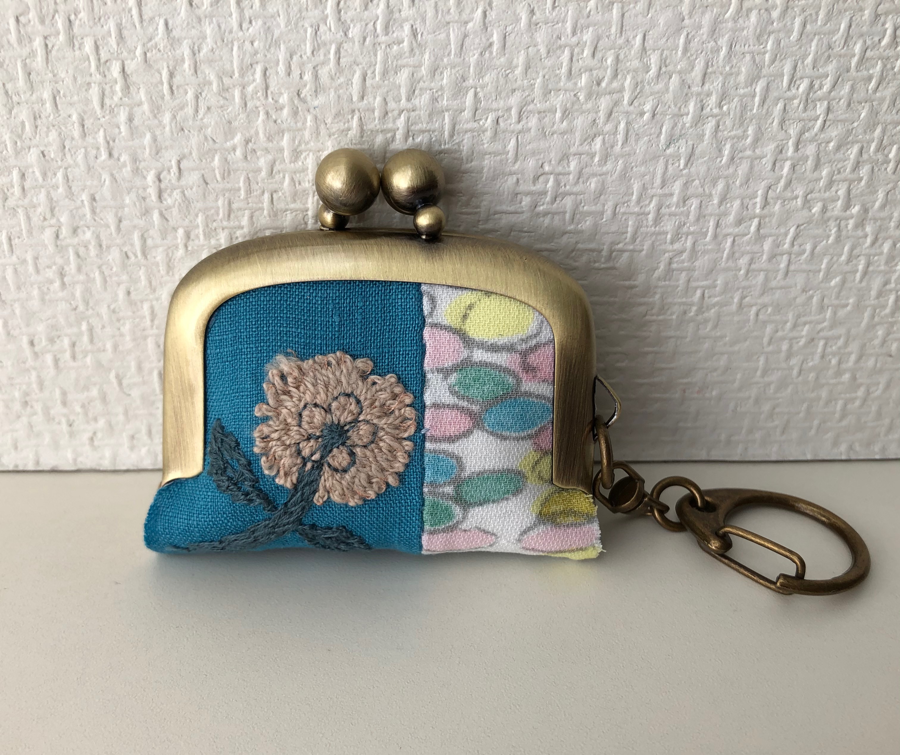 ミナペルホネン choucho(青系) 浮足がま口長財布 ふら