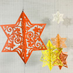オレンジ色の星モビール (アンティーク装飾模様) 1枚目の画像