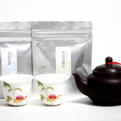 台湾茶 茶器セット 桃柄 茶壺（急須）大と茶杯（湯呑み）2つ　凍頂烏龍茶10g ジャスミン茶10g 中国茶 1枚目の画像