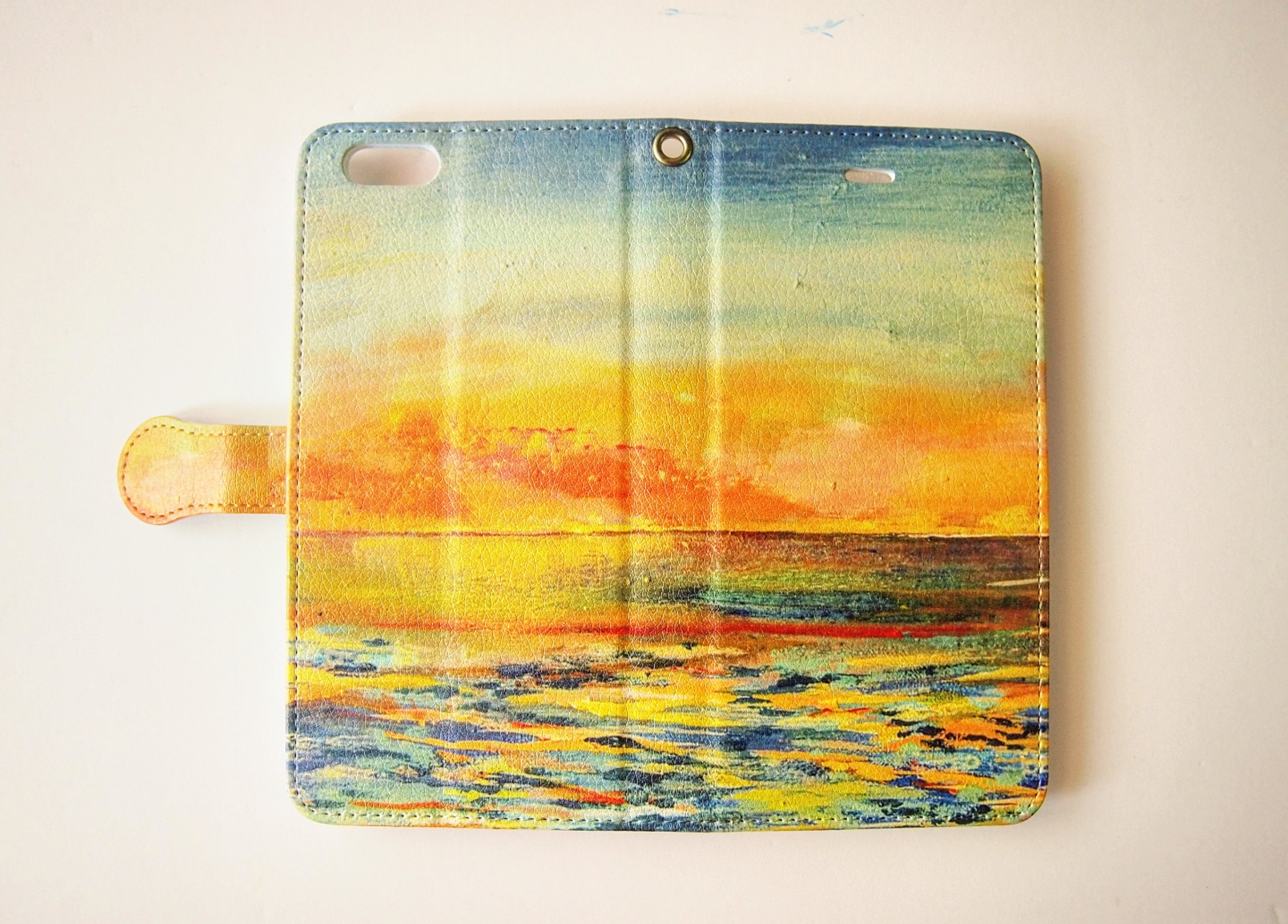 受注制作/朝焼けの空と海の絵  手帳型スマホケース