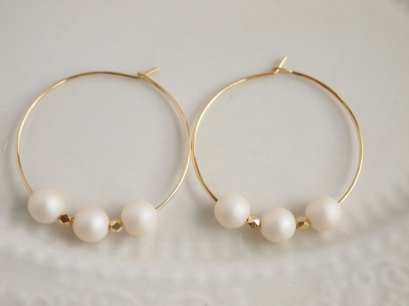 Hoop pierce poppy pearl 1枚目の画像