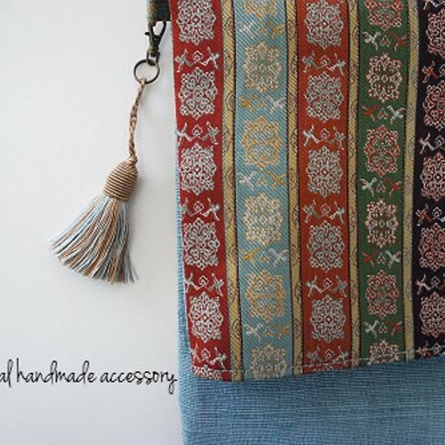 【匿名配送・新品・未使用】 クラッチバッグ　龍村美術織物　糸屋輪宝手 未使用 京都 龍村美術織物 クラッチバッグ 赤地おしどり唐草文錦