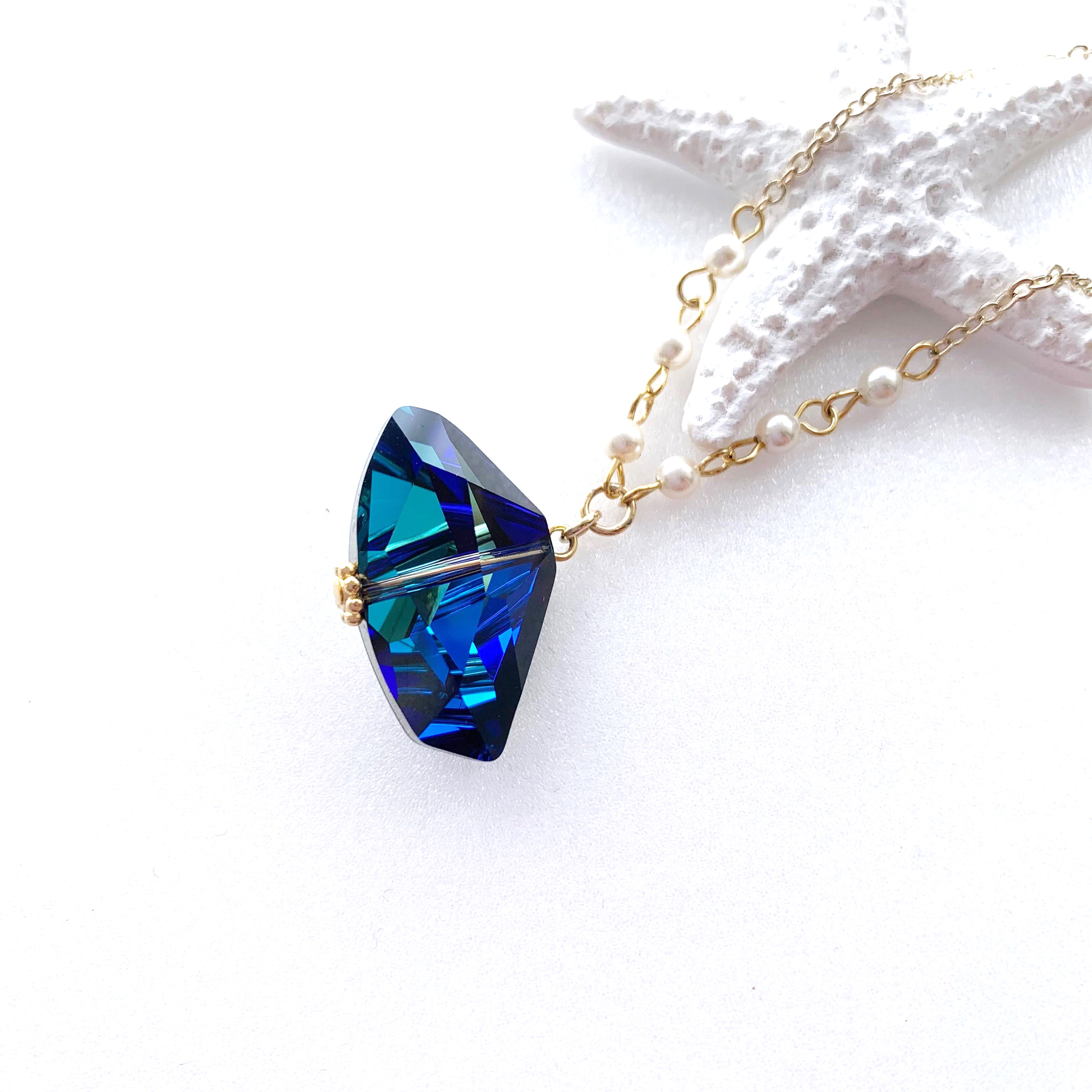 バミューダブルーの煌めき～スワロフスキーロングネックレス