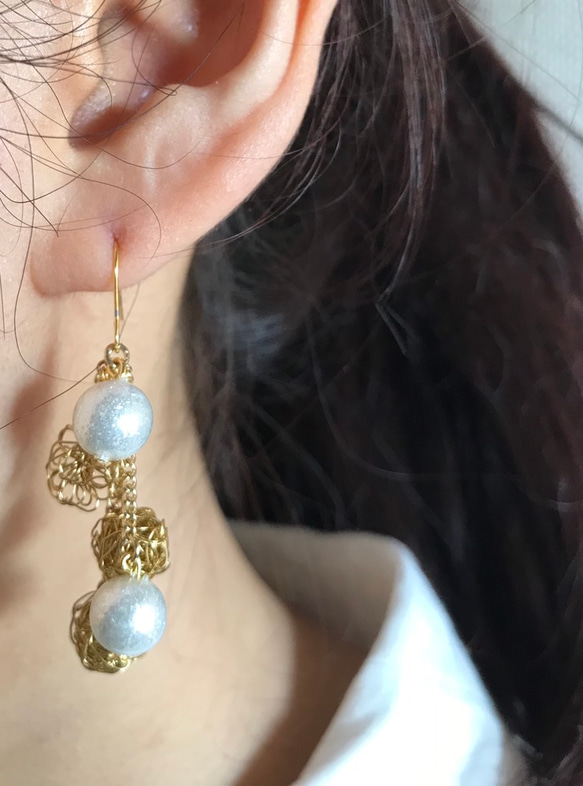 珍珠設計耳環 第2張的照片