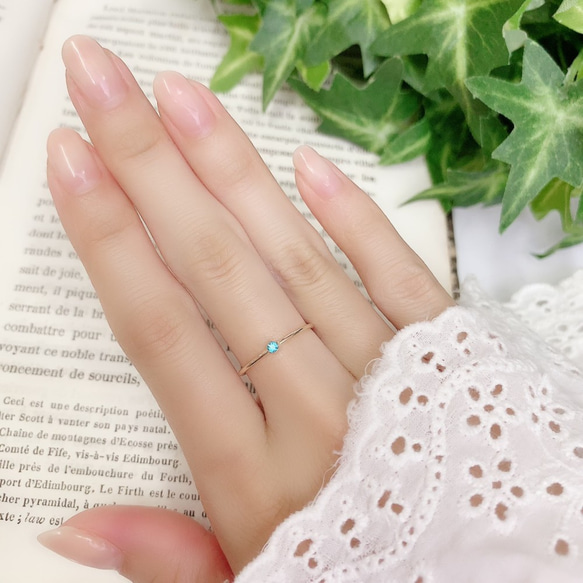 承重14公斤，2毫米寶石包鑲天藍色托帕石直戒/防勾絲包鑲，可全天配戴 第6張的照片