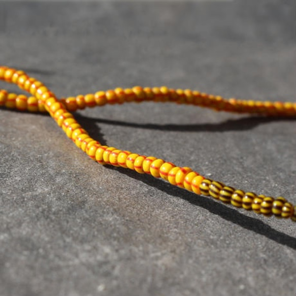 ベネチアン/カンネッテ beads  yellow x orange 1連 1枚目の画像