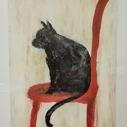 黒猫と赤い椅子 1枚目の画像