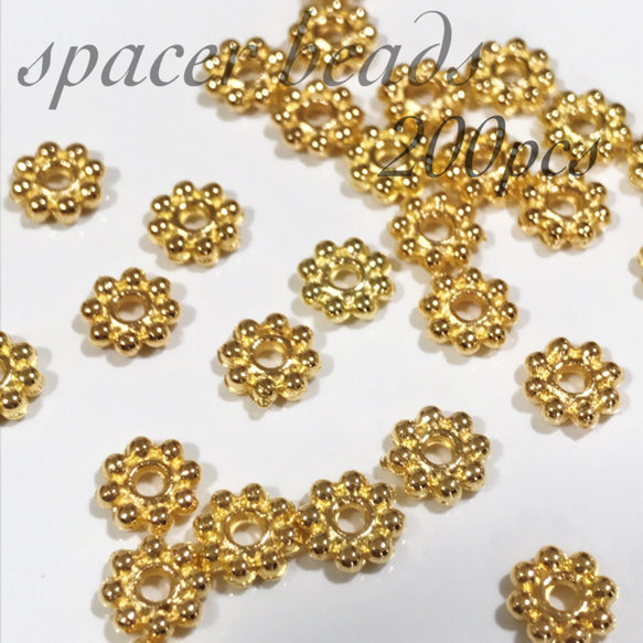 送料無料 ゴールド 200個 花型 スペーサー ロンデル 1枚目の画像